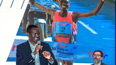 Paul Tergat, left, talks during the unveiling of the course for the inaugural Adnoc Abu Dhabi Marathon in September. Victor Besa / The National