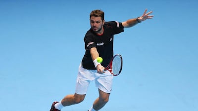 Stanislas Wawrinka of Switzerland survived a second-set stumble to defeat Tomas Berdych of the Czech Republic at the ATP World Tour Finals at O2 Arena in London. Wawrinka will face either David Ferrer or Rafael Nadal, who called on the ATP to consider other surfaces to play the Tour Finals, next. Clive Brunskill / Getty Images