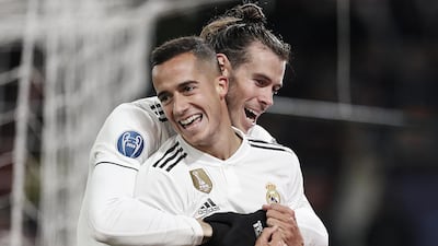 Real Madrid goalscorers Lucas Vazquez, front, and Gareth Bale celebrate a 2-0 win over Roma. EPA