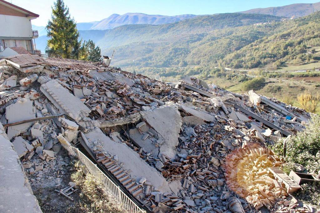 A building collapsed in L’Aquila after the strong earthquake in central Italy. Claudio Lattanzio / EPA