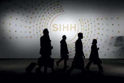 Visitors arrive for the Salon International de la Haute Horlogerie (SIHH) in Geneva. Bloomberg