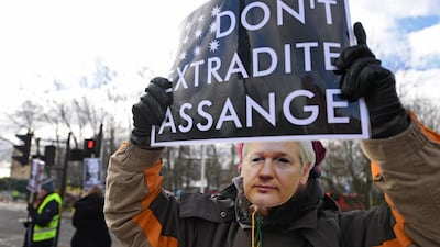 Julian Assange supporters protest outside Woolwich Crown Court in London. EPA