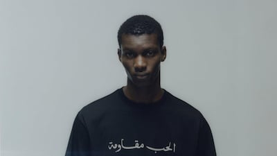 The new T-shirt by Qasimi reads 'love is resistance' on the front in Arabic. Courtesy Qasimi