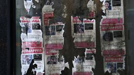 Tattered posters depicting Israeli hostages, kidnapped during Hamas's attack on Israel on October 7, 2023, plastered on the window of empty properties in New York City. Reuters