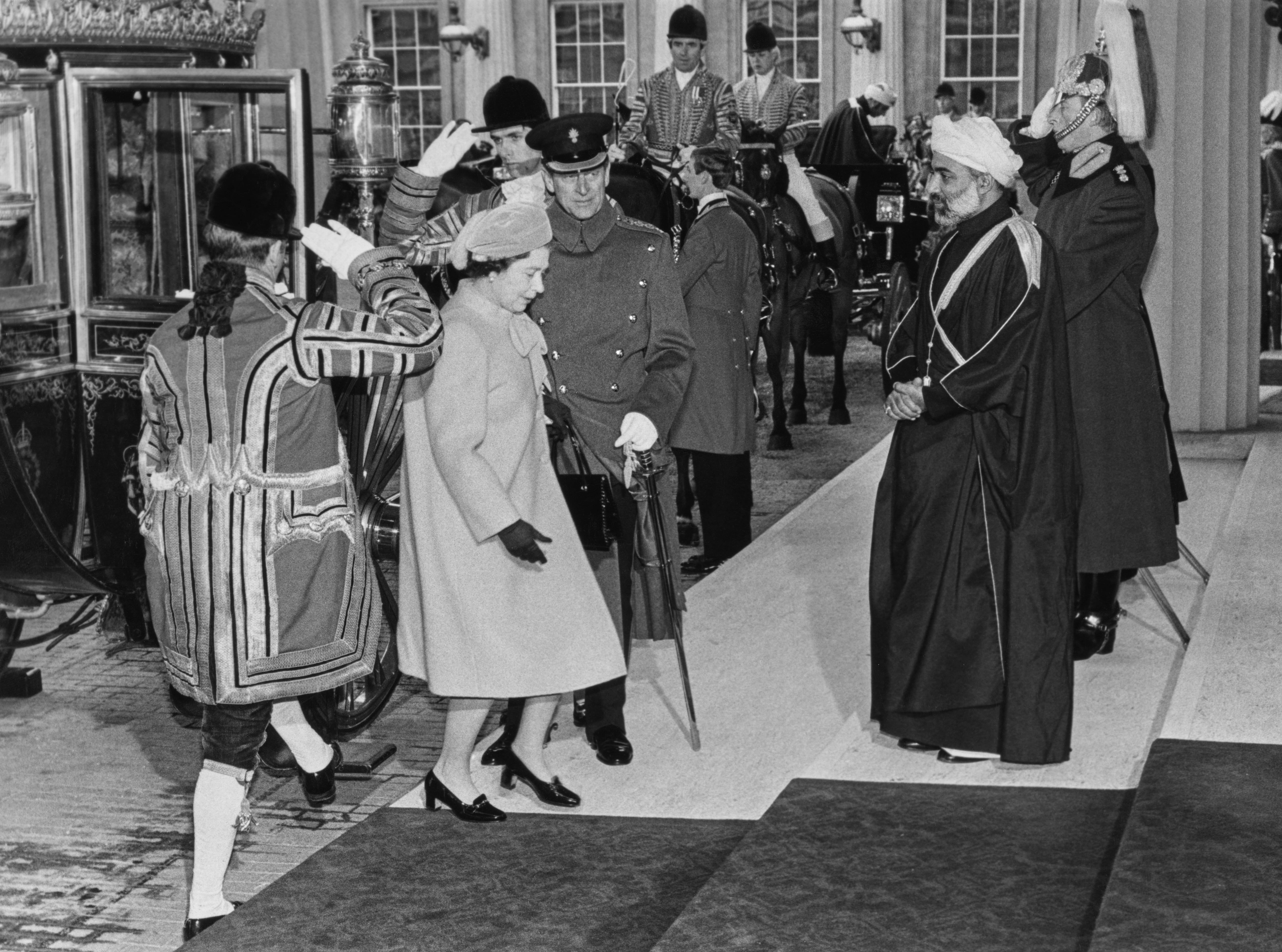 The late Sultan Qaboos with Queen Elizabeth and Prince Philip, arriving at Buckingham Palace for a state visit in 1982. Getty