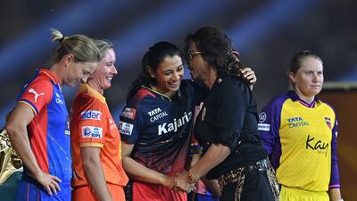 Bollywood star Shah Rukh Khan with RCB captain Smriti Mandhana and others during the opening ceremony of the 2024 WPL. AFP