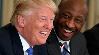 Happier times: Merck CEO Kenneth Frazier led the exodus from Donald Trump's business council (AP Photo/Evan Vucci)