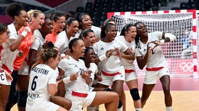 Players of France celebrate winning the gold medal after winning the Women's Handball Gold Medal match against Team ROC.