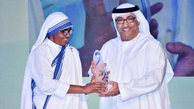 Dr Abdul Rahman Al Owais, Minister of Health and Prevention, receives the Mother Teresa Memorial International Award for Social Justice on behalf of Sheikh Abdullah bin Zayed. Wam