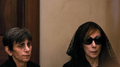 Fairouz and her daughter Reema Rahbani receive condolences during the funeral. AFP