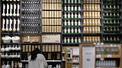 A customer looks at a toothbrush section at the store Muji in Tokyo, Japan, on December 2. Bloomberg