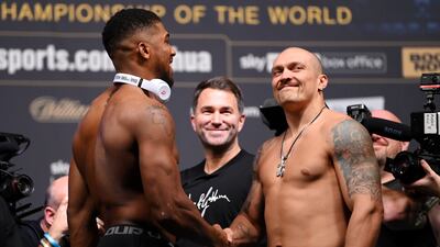 Anthony Joshua and Oleksandr Usyk shake hands. Getty Images