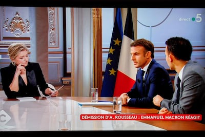 French President Emmanuel Macron speaks with French journalist Anne-Elisabeth Lemoine. AFP
