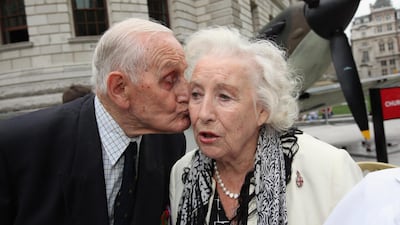 A Battle of Britain veteran kisses Dame Vera Lynn in front of a Mark IV Supermarine Spitfire replica on August 20, 2010 in London, England. Getty Images