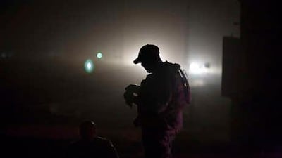 An Iraqi interpreter from Baghdad on patrol with US forces in Mosul.