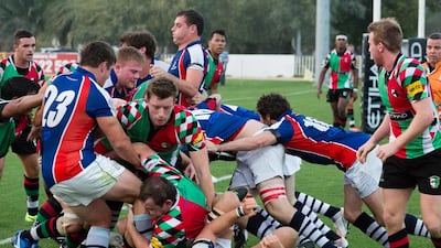 The Jebel Ali Dragons and Abu Dhabi Harliquins in action on Friday. Duncan Chard for the National