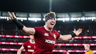 Lions' Tom Curry celebrates scoring a first-half try during the match in Melbourne. PA