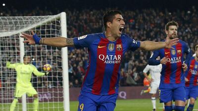 Barcelona's Luis Suarez celebrates after scoring their first goal against Real Madrid last week. Albert Gea / Reuters