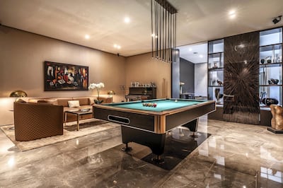 Just be careful where you put the chalk down during a game of pool. Courtesy LuxuryProperty.com