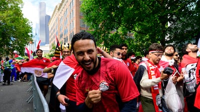 An Egypt supporter marching in a parade ahead of the Egypt game. Getty Images via AFP