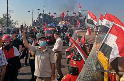 Anti-government protesters in Baghdad. AP Photo