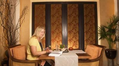 Megan Wynes, a single thirtysomething editor, finds that she dines alone a lot and doesn't have the advantage of splitting the bill with a partner. She took out a loan to survive when she came to Abu Dhabi in 2005.