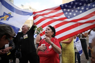 Israelis celebrate after US President Donald Trump announced that Israel and Hamas agreed on the first phase of a Gaza ceasefire, in Tel Aviv. Reuters