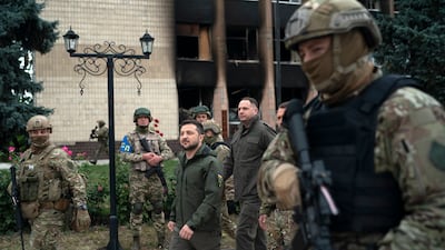 Ukrainian President Volodymyr Zelenskyy leaves after attending a national flag-raising ceremony in Izyum on Wednesday. AP Photo