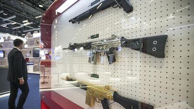Gold and chrome plated weapons displayed by Pakistan Ordnance factories at Idex in Abu Dhabi. Mona Al Marzooqi / The National