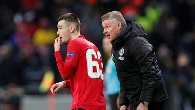 Manchester United manager Ole Gunnar Solskjaer gives instructions to Dylan Levitt. Reuters