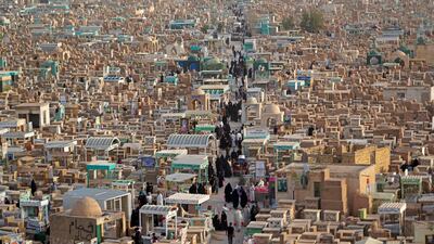 Muslims visiting the graves of relatives at the Wadi al-Salam (Valley of Peace) cemetery in the city of Najaf, Iraq, during Eid Al Fitr. AFP