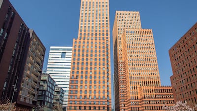 APG Asset Management headquarters in Amsterdam, Netherlands. “Because of low interest rates, we have to cast our nets far and wide to search for returns,” said the company's chief investment strategist. Alamy