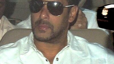 Indian Bollywood film actor Salman Khan arrives in a car to appear at the sessions court in Mumbai on May 6, 2015. AFP