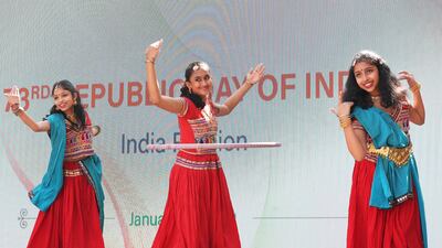 Children took part in musical and dance performances, while many in the crowds were decked out in green and saffron, the colours of India's flag