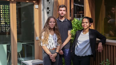 Students Noemie Jaupart, left, and Axel Bule with their adviser, Vidya Mohanan. All photos: Victor Besa / The National