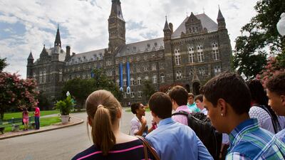 Prospective students tour Georgetown University's campus in Washington. AP