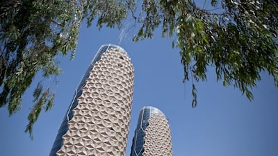 The Al Bahar Towers in Abu Dhabi use a solar shading system to keep the building cool. The UAE is currently home to 869 green-rated buildings, the 14th highest national concentration globally and the only country in the region in the top 30, according to Knight Frank. Silvia Razgova / The National.