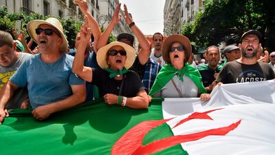 Protesters shout slogans as they demonstrate in Algiers, Algeria. AFP