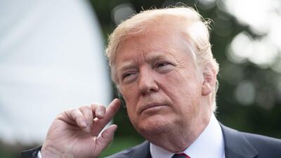 US President Donald Trump takes questions from the press before departing leaving the White House for the G7 summit on June 8, 2018. Nicholas Kamm / AFP