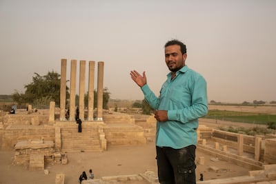 Rashad, 23, takes a break after driving visitors to the site of the Queen of Sheba's throne, a temple in Marib. Asmaa Waguih for The National
