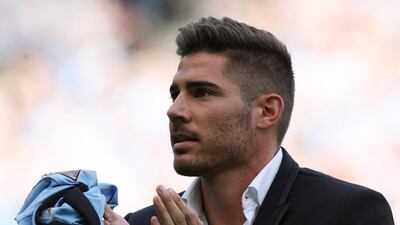 epa03379033 Manchester City new signing Javi Garcia is presented to supporters prior to the English Premier League soccer match between Manchester City and QPR at the Etihad Stadium in Manchester, Britain, 01 September 2012. Javi Garcia on 31 August signed for City from Portuguese club Benfica. EPA/LINDSEY PARNABY DataCo terms and conditions apply http//www.epa.eu/downloads/DataCo-TCs.pdf *** Local Caption *** 03379033.jpg