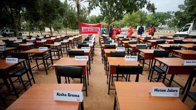 FILE PHOTO: Names of missing Chibok school girls kidnapped by Boko Haram insurgency five years ago are displayed during the 5th year anniversary of their abduction, in Abuja, Nigeria April 14, 2019. REUTERS/Afolabi Sotunde/File Photo