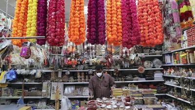 Vijay Kumar arranging decoration items for Diwali festival at his shop in Bur Dubai area in Dubai. Diwali is the Indian festival of lights. Pawan Singh/The National