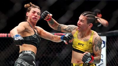 Jessica Andrade, right, punches Mackenzie Dern during their fight at UFC 295 at Madison Square Garden. USA Today