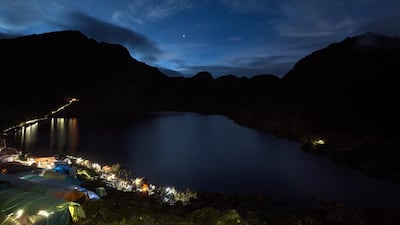 Devotees pray in the early morning at Gosaikunda Lake. Narendra Shrestha/EPA