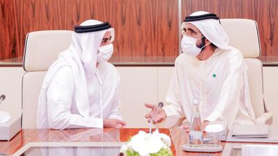 Sheikh Mohammed bin Rashid, Prime Minister and Ruler of Dubai, speaks to Sheikh Saif bin Zayed, Deputy Prime Minister and Minister of Interior, during a UAE Cabinet session on Monday. Courtesy: Sheikh Mohammed bin Rashid Twitter