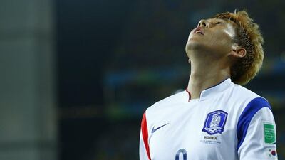 South Korea's Son Heung-min reacts during his team's 1-1 draw with Russia on Tuesday night at the 2014 World Cup in Cuiaba, Brazil. Eddie Keogh / Reuters