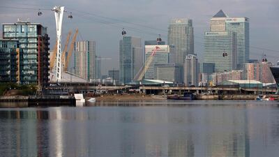 The Emirates Air Line cable car passing London's financial district, Canary Wharf. Justin Tallis / AFP