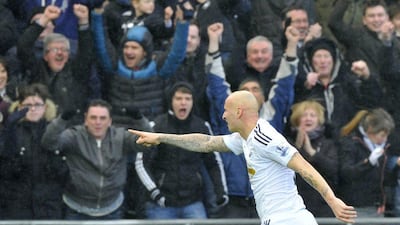 Swansea’s Jonjo Shelvey celebrates after helping create his side’s second goal in a 2-1 win over Manchester United on Saturday. Rebecca Naden / Reuters