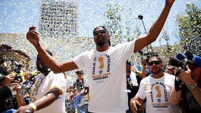 Golden State Warriors forward Kevin Durant celebrates with fans. Durant was named NBA Finals MVP for the second season running. Cary Edmondson / Reuters